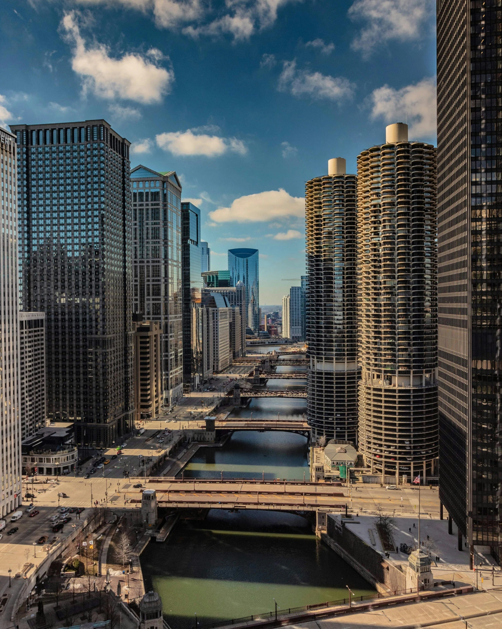 a river running through a city next to tall buildings, chicago, unsplash photo contest winner, slide show, 2 0 2 2 photo