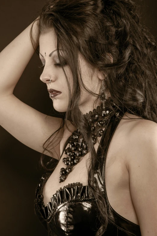 a woman in a corset posing for a picture, an album cover, trending on deviantart, leather jewelry, shot with sony alpha, hands in her hair. side-view, wearing intricate black choker