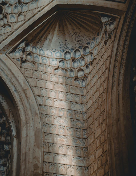 a clock mounted to the side of a building, a marble sculpture, inspired by Luis Paret y Alcazar, unsplash contest winner, romanesque, mosque interior, volumetric light and shadow, high arches, hyperdetailed photograph