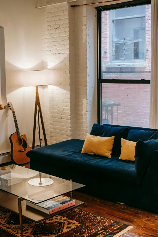 a living room filled with furniture and a guitar, by Gavin Hamilton, unsplash contest winner, light and space, city apartment cozy calm, large couch, 15081959 21121991 01012000 4k, a cozy old victorian loft