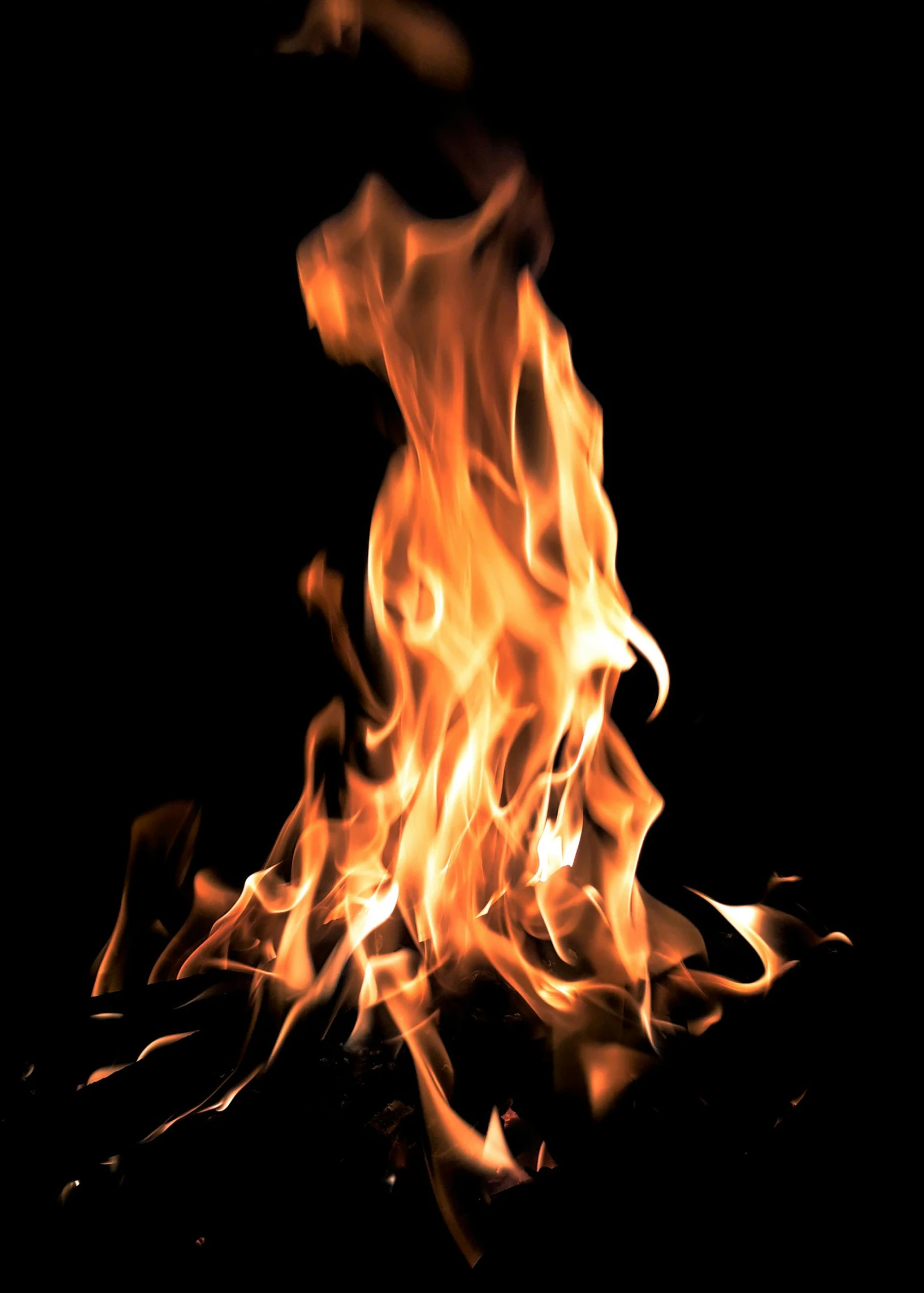 a close up of a fire on a black background, an album cover, by Rodney Joseph Burn, istockphoto, accurate portrayal, tiny firespitter, 2 0 0 0 s