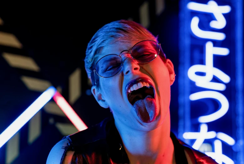 a woman with her mouth open in front of a neon sign, pexels, bauhaus, androgynous vampire, cory chase as an atlantean, scene from a rave, yelling furiously