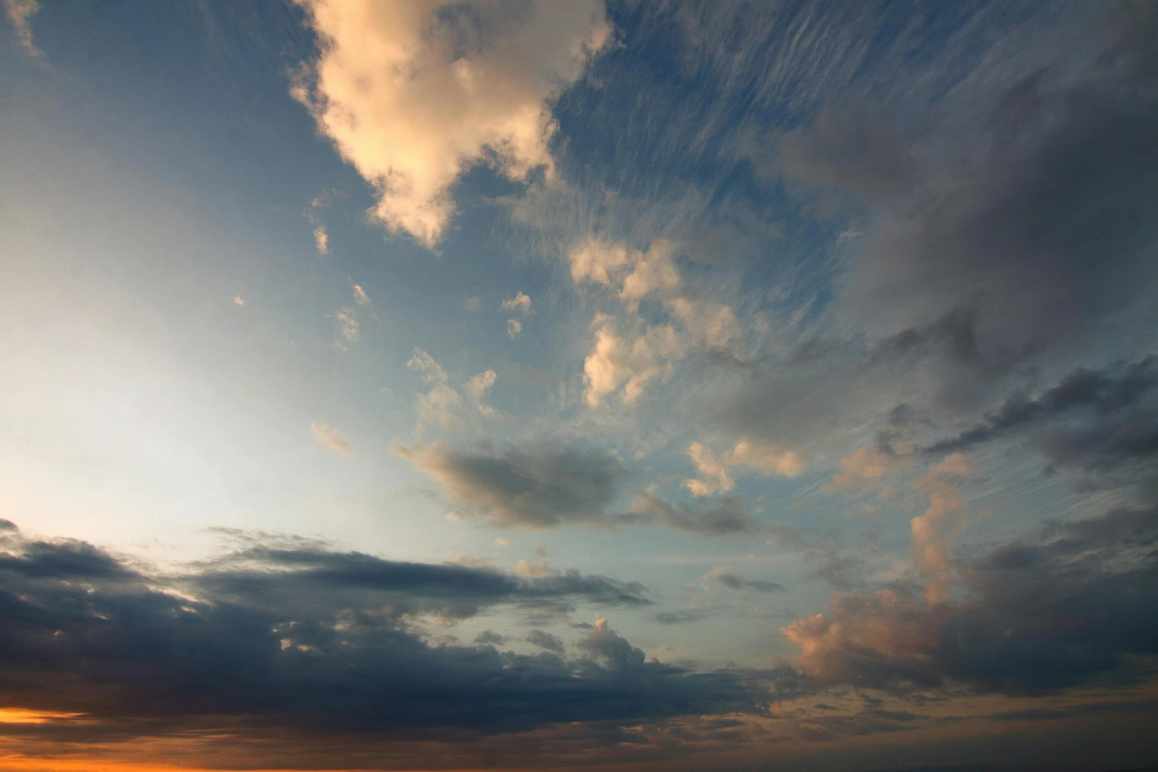 a large body of water under a cloudy sky, a picture, unsplash, romanticism, sunset + hdri, cumulus, 8k resolution”, uniform plain sky