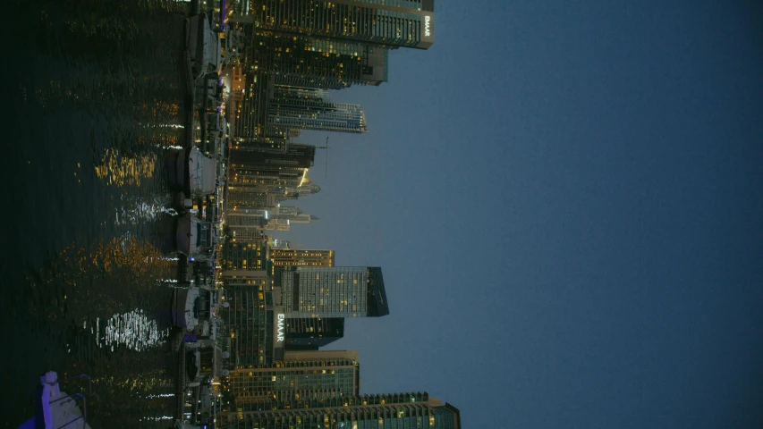 a view of a city at night from a boat, inspired by Thomas Struth, pexels contest winner, hurufiyya, gta : dubai, phone wallpaper, standing on a skyscraper rooftop, today\'s featured photograph 4k