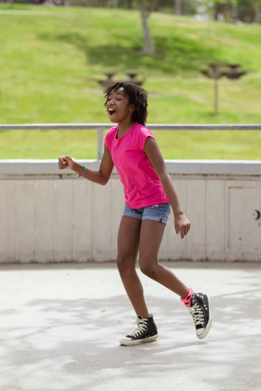 a young girl riding a skateboard down a sidewalk, happening, smiling and dancing, dark-skinned, at a skate park, photo courtesy museum of art