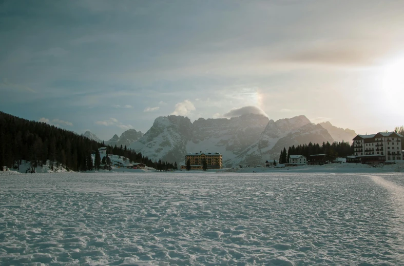 a man riding skis down a snow covered slope, a matte painting, pexels contest winner, lago di sorapis, judy chicago, seen from afar, moody : : wes anderson