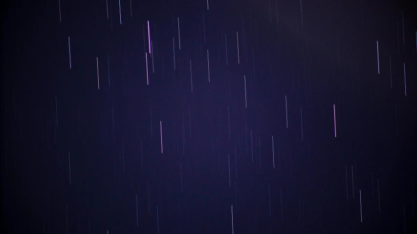 a long exposure of stars in the night sky, an album cover, unsplash, thin straight purple lines, it's raining, 2 4 0 p footage, star rain