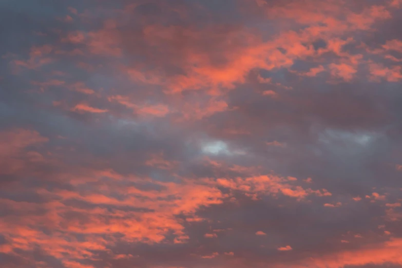 there is a plane that is flying in the sky, inspired by Frederic Church, pexels contest winner, romanticism, redpink sunset, layered stratocumulus clouds, today\'s featured photograph 4k, soft grey and red natural light