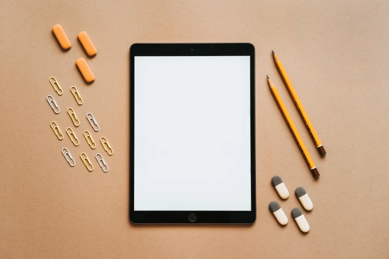 a tablet computer sitting on top of a table, by Carey Morris, trending on pexels, computer art, knolling, teacher, brown and white color scheme, multiple stories