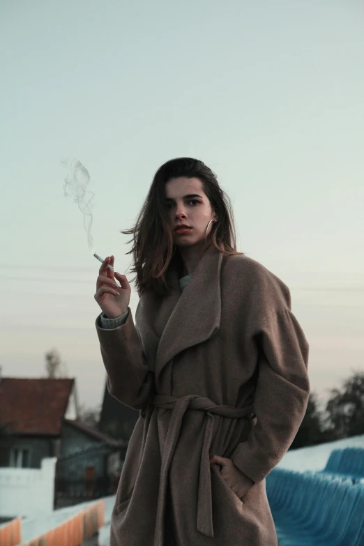 a woman in a brown coat smokes a cigarette, inspired by Elsa Bleda, pexels contest winner, renaissance, teen girl, parted hair, instagram picture, smoke in the sky