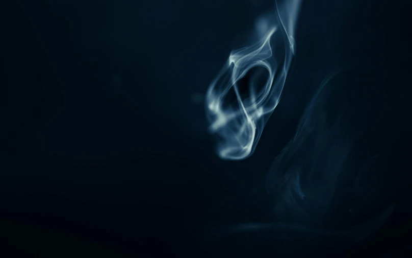 a close up of smoke on a black background, by Daniel Lieske, pexels contest winner, digital art, desaturated blue, a friendly wisp, today\'s featured photograph 4k, videogame still