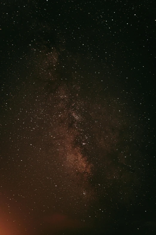 a lighthouse at night with the milky in the background, pexels, light and space, ((space nebula background)), brown ) ), heavy grainy picture, looking up onto the sky