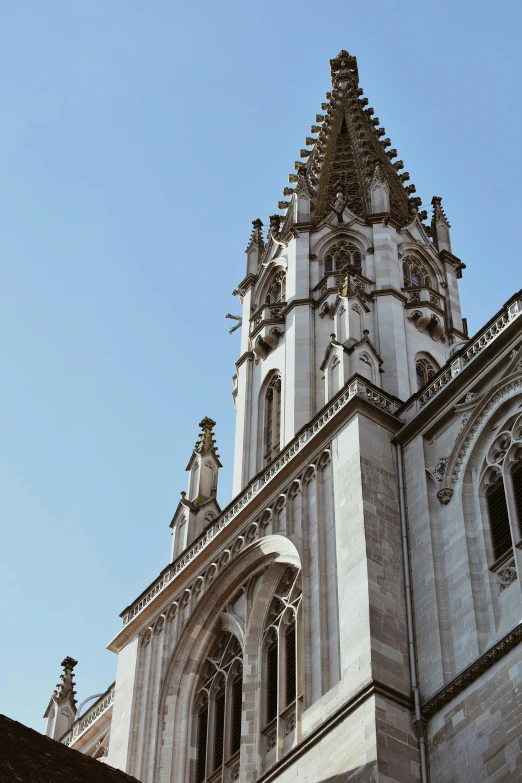 a very tall building with a clock on it's side, by Bertalan Székely, unsplash, baroque, alabaster gothic cathedral, buenos aires, buttresses, white building