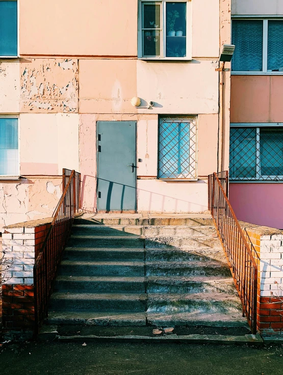 a red fire hydrant sitting in front of a building, an album cover, inspired by Elsa Bleda, pexels contest winner, brutalism, stairway, colorful house, west slav features, pastel colours overlap