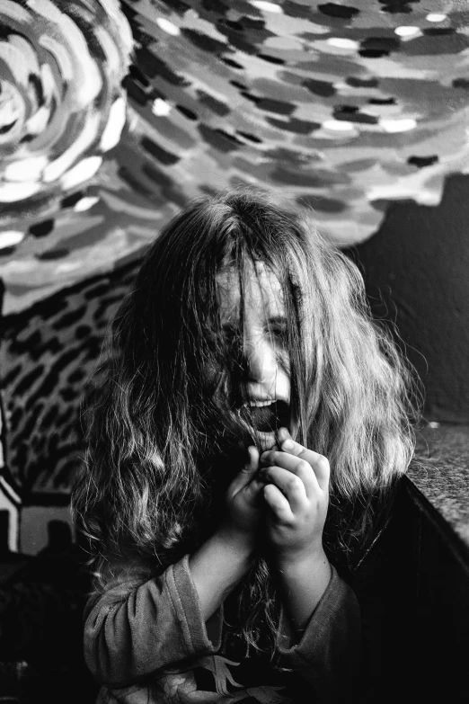 a black and white photo of a girl eating a donut, inspired by Lasar Segall, long shaggy-haired rocker, psychedelic laughing demon, 1996), bedhead