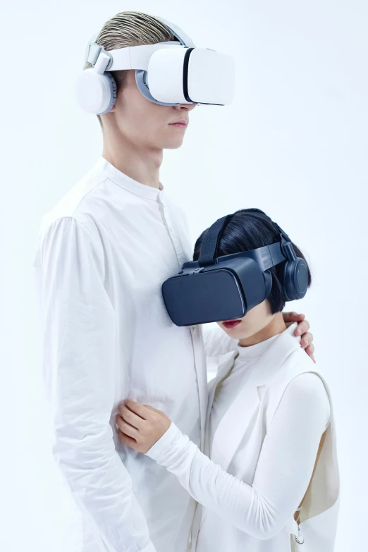 a man and a woman wearing virtual reality headsets, inspired by Fei Danxu, trending on tumblr, demur, embracing, korean, navy