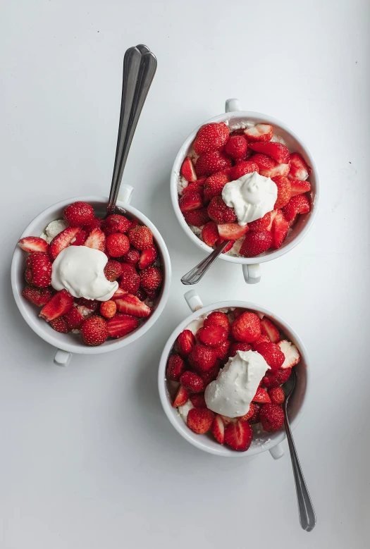 three bowls filled with strawberries and whipped cream, unsplash, berries inside structure, stew, dynamic angled shot, with a white background