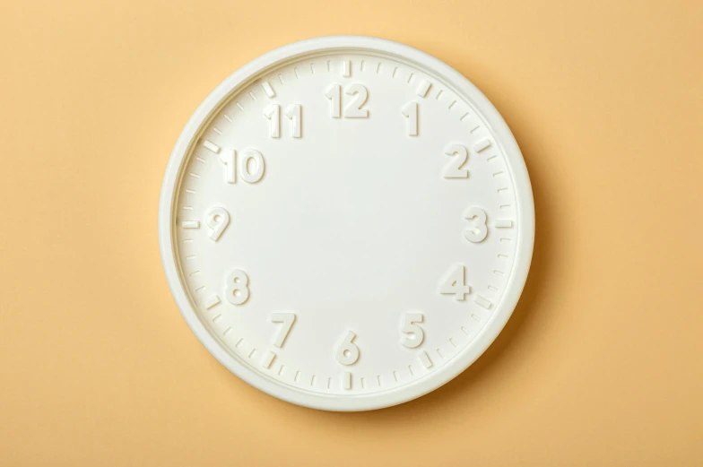 a white clock sitting on top of a yellow wall, inspired by Andrei Kolkoutine, trending on pexels, plasticien, silicone skin, ready to eat, white background and fill, all enclosed in a circle