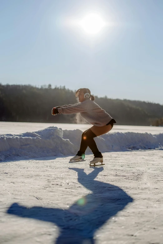 a man riding a skateboard down a snow covered slope, on a lake, craigville, ice princess, doing a kick