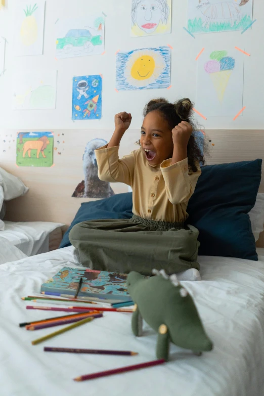 a little girl sitting on top of a bed, a child's drawing, pexels contest winner, cheering, screaming into air, schools, gaming