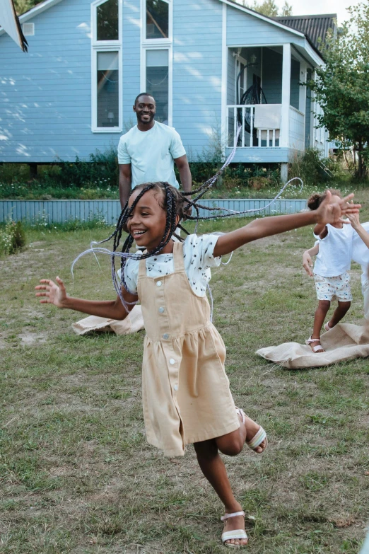 a group of children playing a game of hop hop hop hop hop hop hop hop hop hop hop hop hop hop hop hop hop hop hop hop, an album cover, by Carey Morris, pexels contest winner, photo of a black woman, dad energy, cottagecore hippie, in louisiana