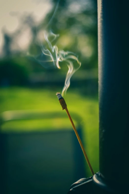 a matchstick with smoke coming out of it, unsplash, light green mist, praying with tobacco, al fresco, indoor shot