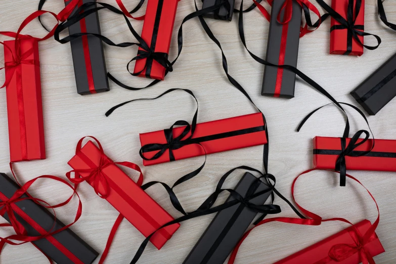 a bunch of red and black gift boxes on a table, pexels contest winner, private press, ribbons, striking colour, obi strip, black