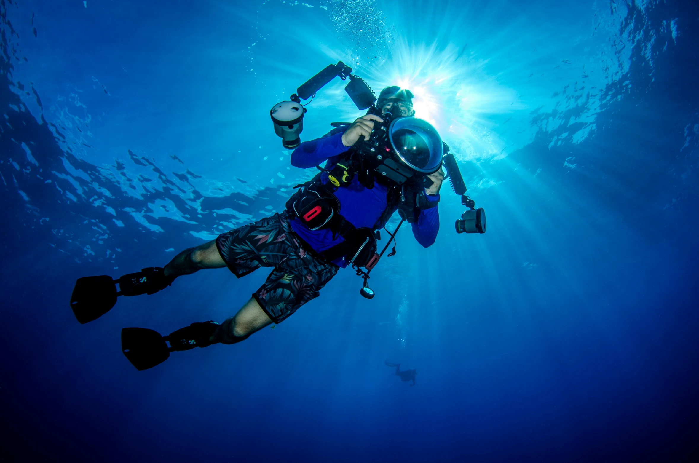 a person diving in the ocean with a camera, a portrait, by Dan Content, happening, blue planet still, avatar image, naoki ikushima, full device