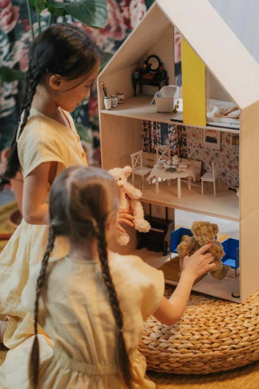 two little girls playing with a doll house, pexels contest winner, flat lay, close - up on detailed, profile image, thumbnail