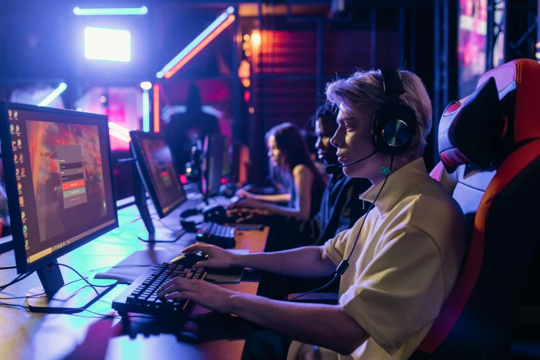 a couple of people that are sitting in front of a computer, video game, header, performing, colour corrected