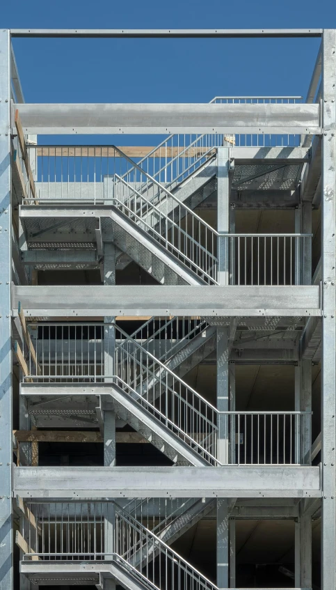 a bunch of stairs going up the side of a building, by Karel Dujardin, hi-res, square, commercial photograph, under construction