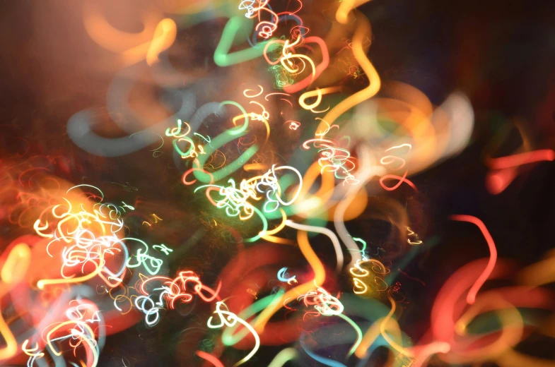 a blurry image of a christmas tree, inspired by Bruce Munro, pexels, lyrical abstraction, multi - coloured, swirly bokeh, multicolor, instagram picture