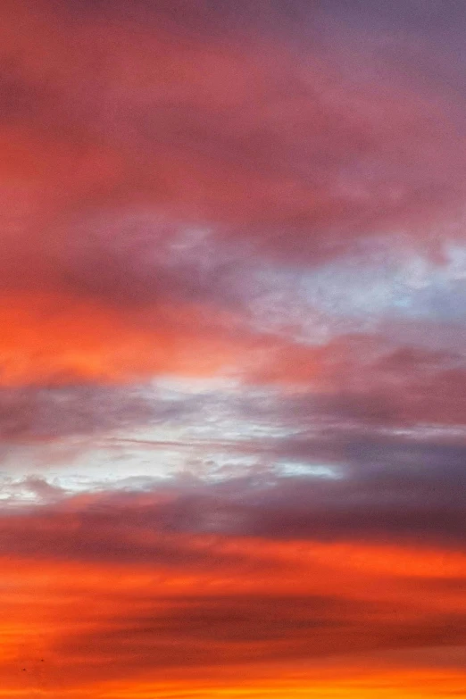 a large body of water under a cloudy sky, a picture, inspired by Frederic Church, unsplash, romanticism, blood red colored sky, deep colour\'s, morning detail, new mexico