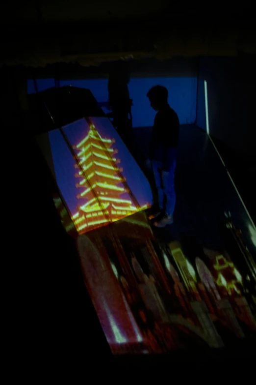 a man riding a skateboard up the side of a ramp, a hologram, inspired by Ryoji Ikeda, interactive art, vietnamese temple scene, slide show, lava lamps, in the dark elevator