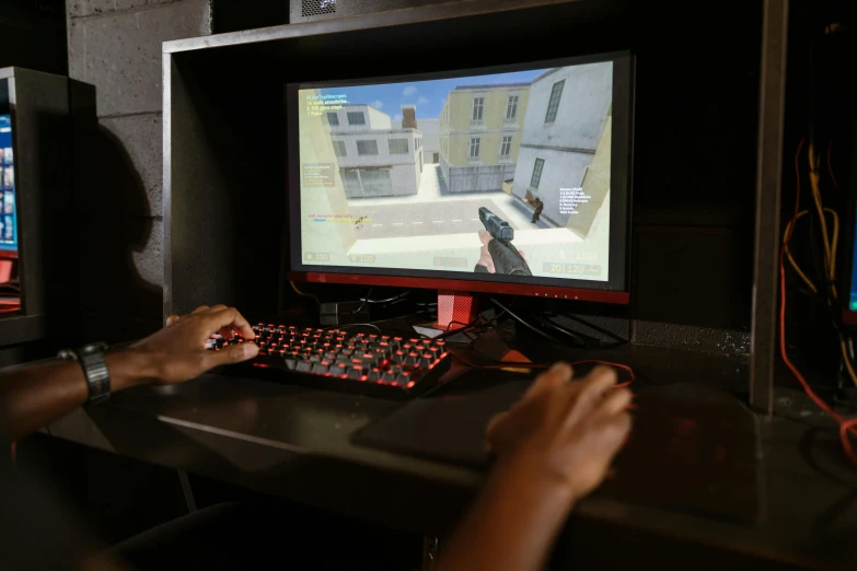 a person playing a video game on a computer, gun at bottom of screen, schools, centered shot, immersive