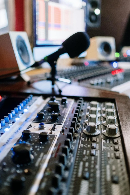 a sound board in a recording studio with a microphone, an album cover, by Dan Content, shutterstock, private press, control panels, radios, live broadcast, sprawling