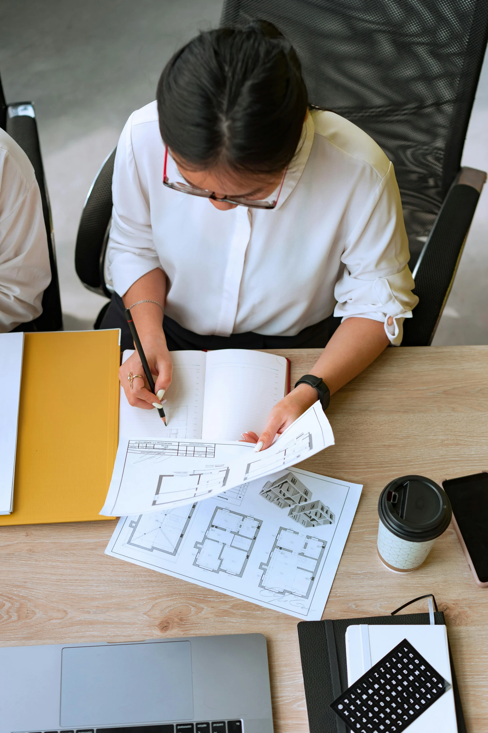 a couple of people sitting at a table with laptops, a cartoon, pexels contest winner, architectural plan, on high-quality paper, square, low quality photo