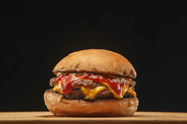 a hamburger sitting on top of a wooden cutting board, unsplash, photorealism, black and yellow and red scheme, melted cheddar, hasselblade wide shot, portrait n - 9