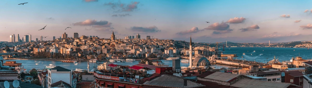 a view of a city from the top of a hill, a colorized photo, pexels contest winner, hurufiyya, kerem beyit, brown, afternoon, youtube thumbnail