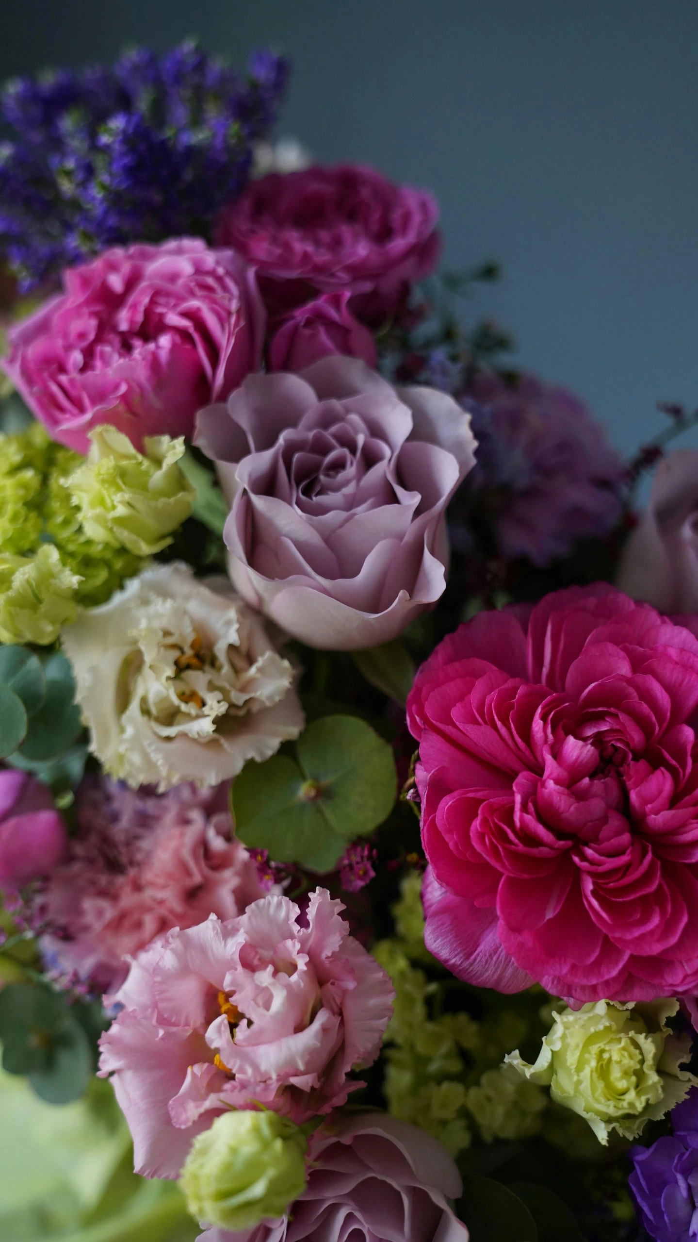 a vase filled with lots of different colored flowers, pink and green colour palette, up close shot, lilac, award - winning