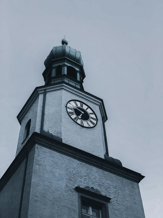 a black and white photo of a clock tower, by Andrei Kolkoutine, pexels contest winner, detmold, desaturated color, marilyn church h, dome