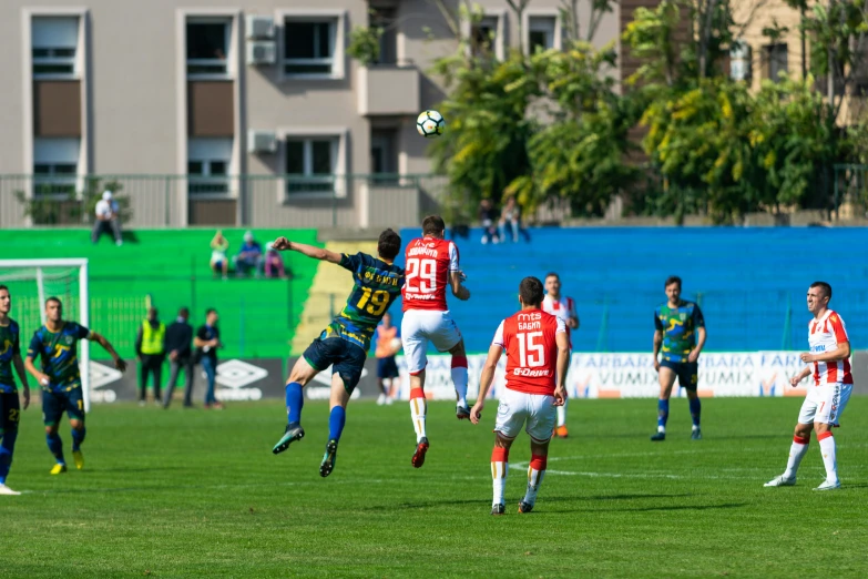 a group of men playing a game of soccer, pexels, bauhaus, hovering in the air, square, anton fadeev 8 k, high quality photo