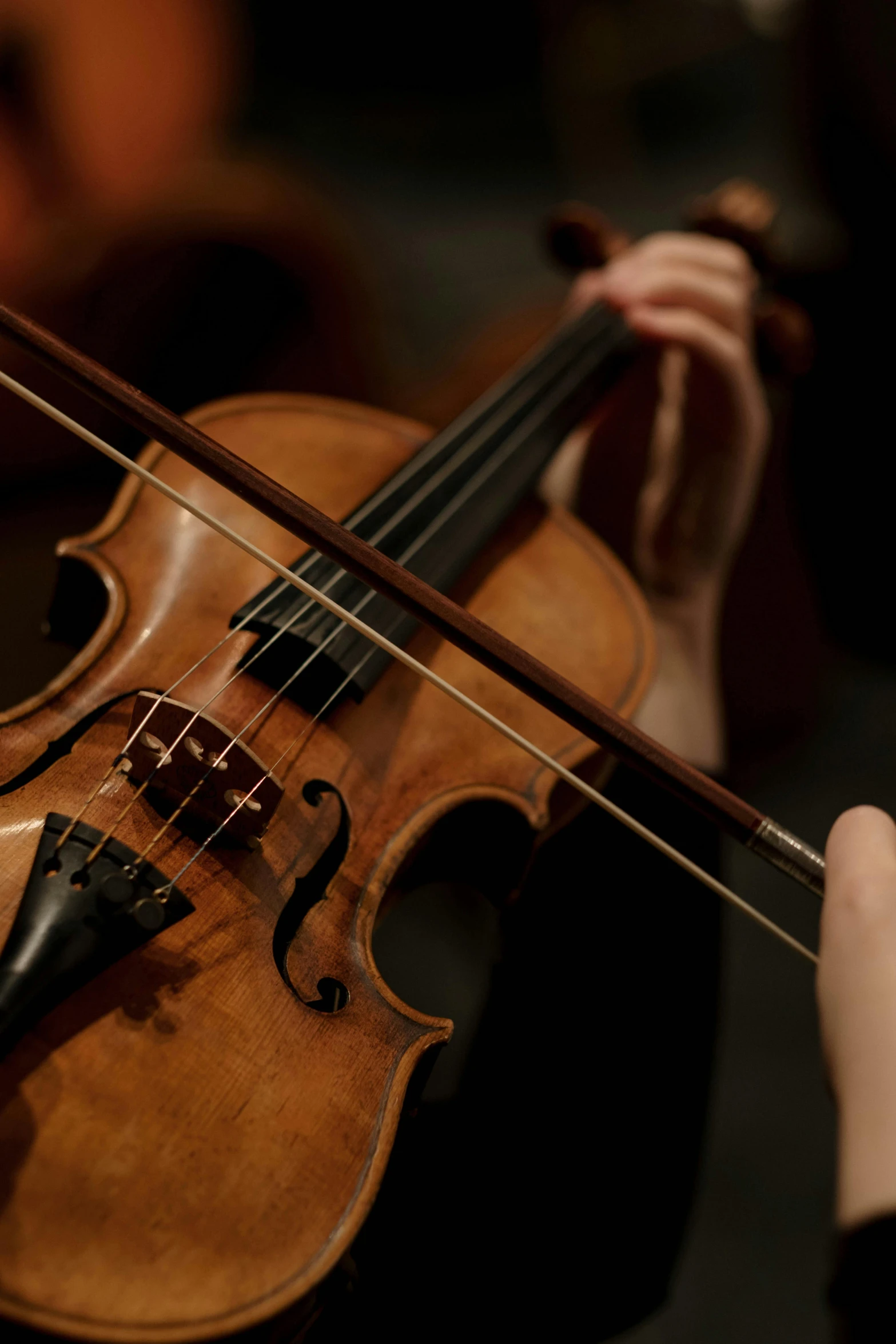 a close up of a person playing a violin, by David Simpson, square, high quality upload, cinematic image, ap