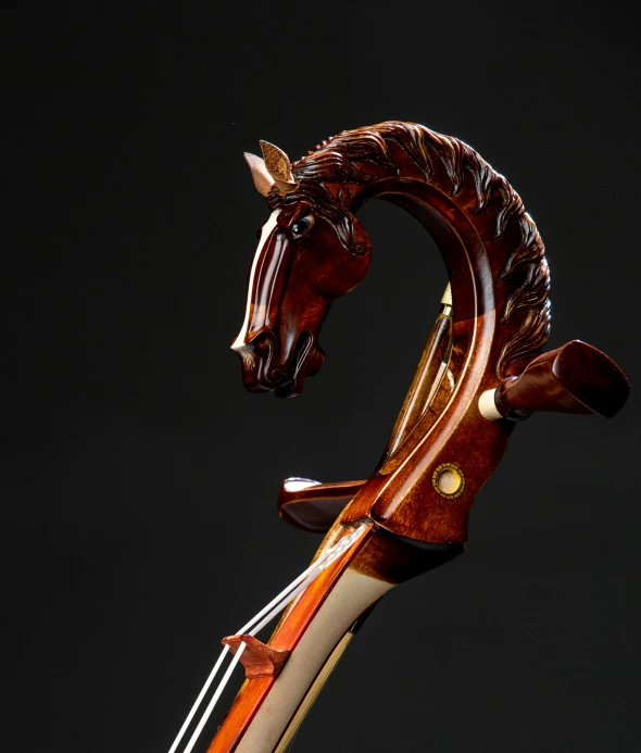 a close up of a violin with a horse head on it, by Alejandro Obregón, side profile view, award-winning style, demur, shepherd's crook