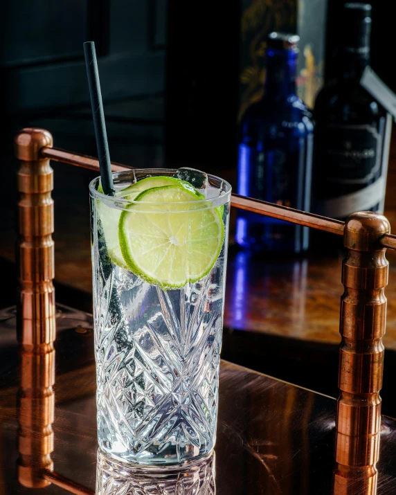 a drink sitting on top of a wooden table, profile image