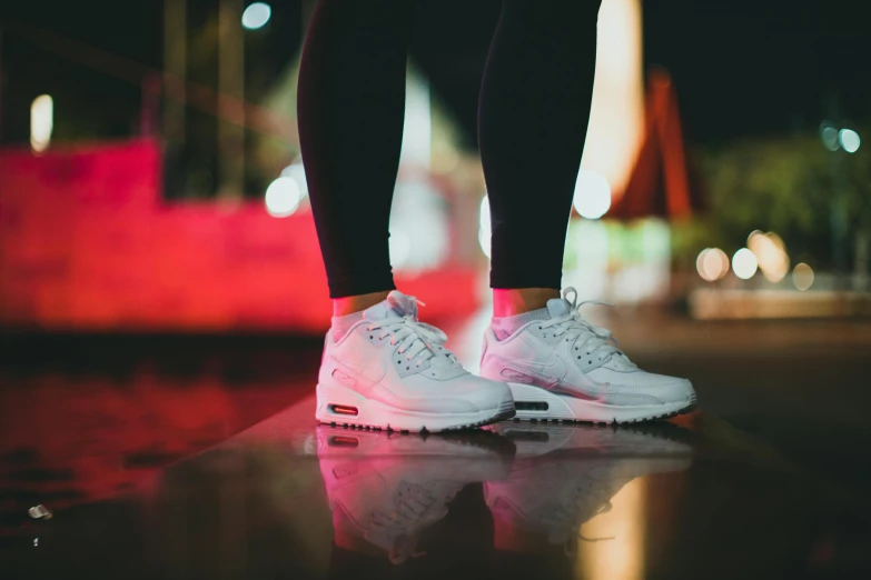 a person wearing white sneakers and black leggings, pexels contest winner, nike air max, night lights, avatar image, high resolution