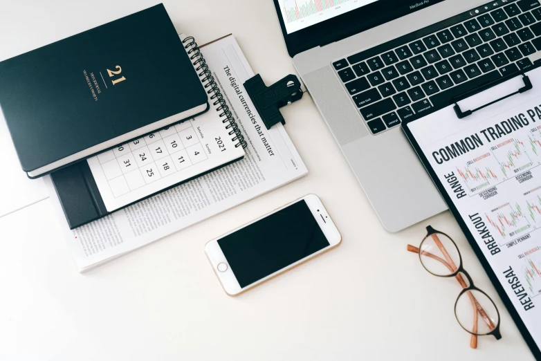 an open laptop computer sitting on top of a desk, trending on unsplash, 9 9 designs, professional iphone photo, knolling, thumbnail