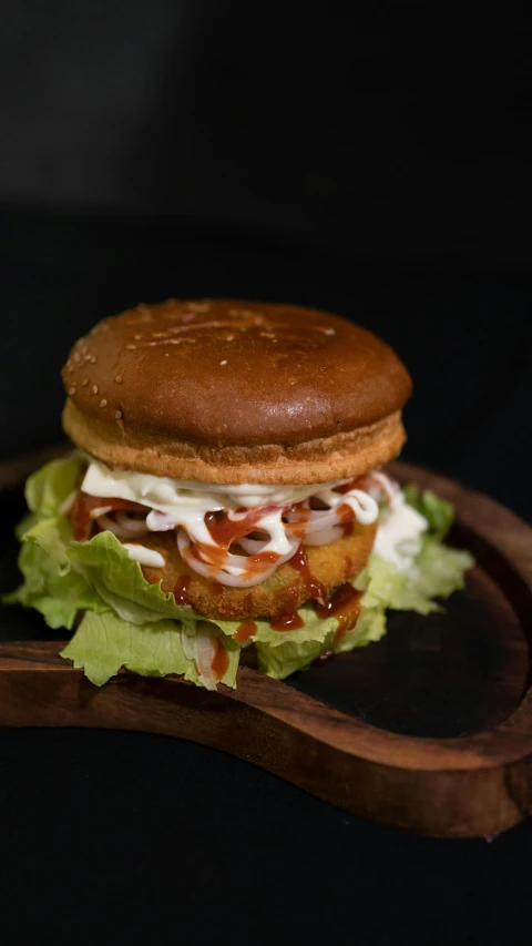 a burger sitting on top of a wooden tray, by Basuki Abdullah, pexels, photorealism, square, 15081959 21121991 01012000 4k, one sandwich with fried tofu, high quality photo