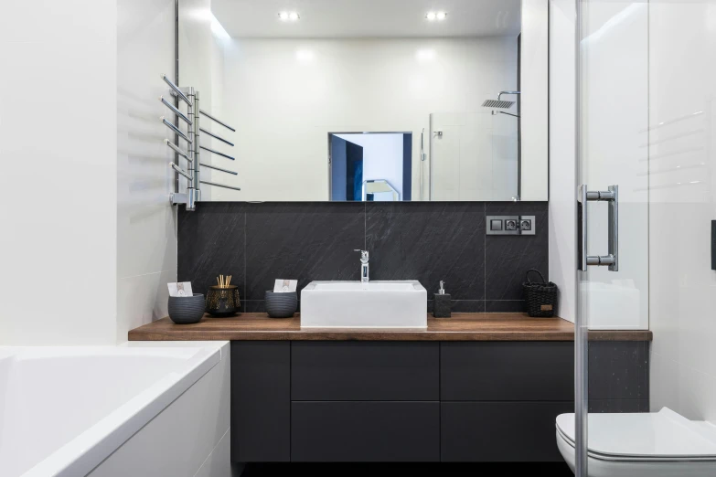 a bath room with a toilet a sink and a bath tub, by Adam Marczyński, unsplash contest winner, altermodern, anthracite, profile image, smooth panelling, chrome accents