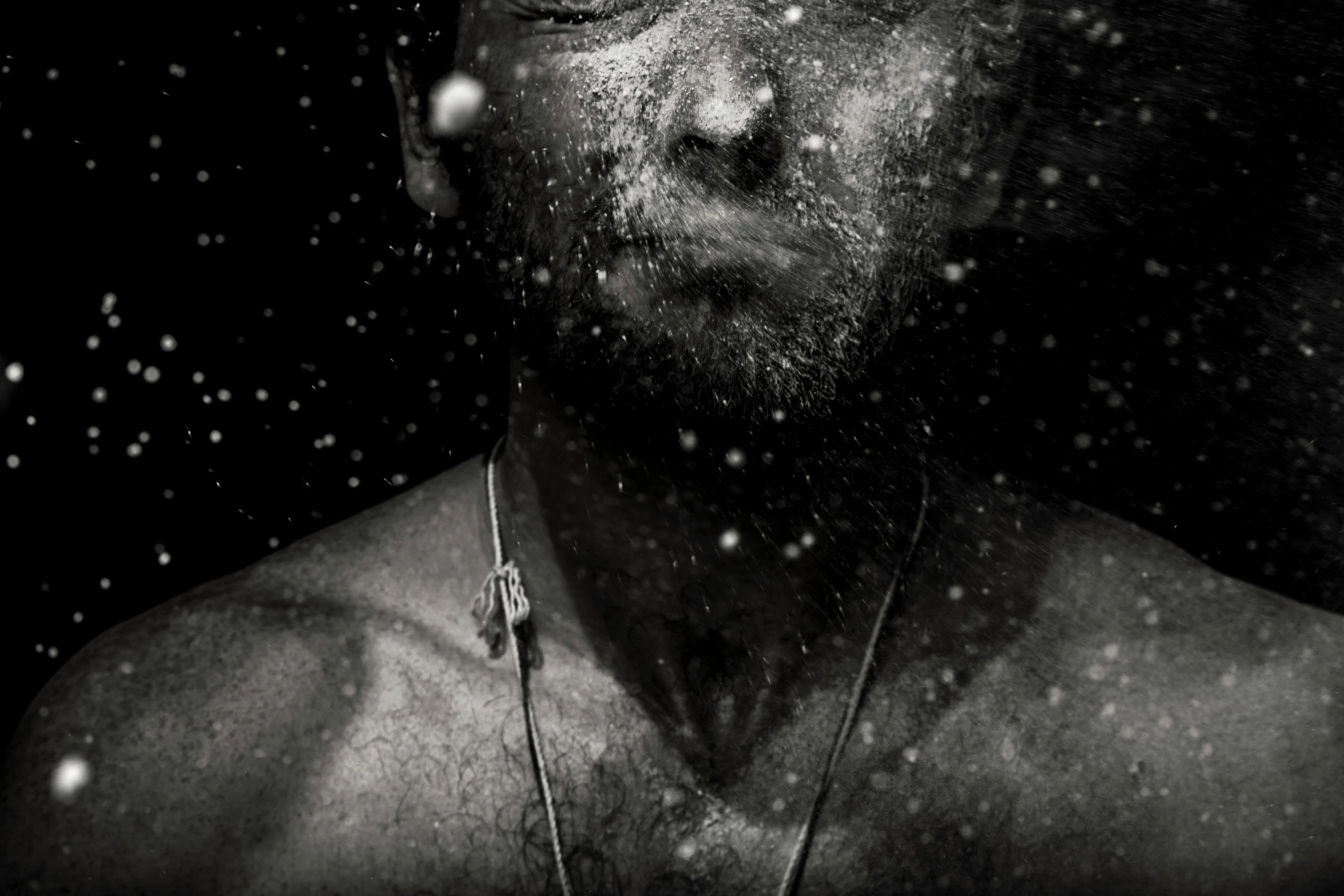 a black and white photo of a man in the snow, inspired by Lee Jeffries, digital art, water is made of stardust, illustration »